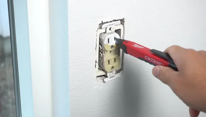 Verify power is off using a voltage detector.