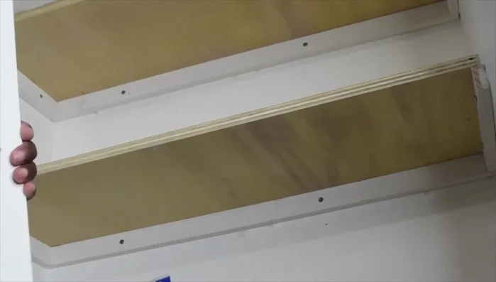 Fill nail holes with wood filler and caulk the seams before painting.