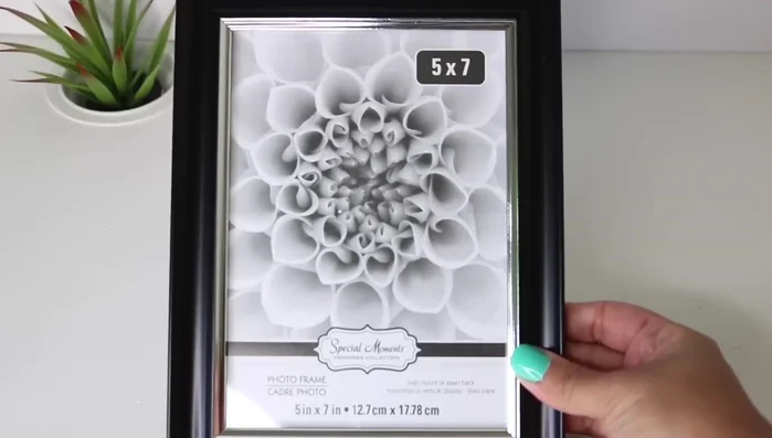 Prepare the door: Remove the insides and glass from 5x7 frames. Use side cutters to remove metal pieces. This specific frame fits the crate.