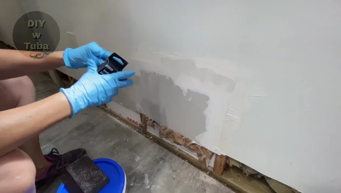 Sand the first coat after it dries, removing high points.