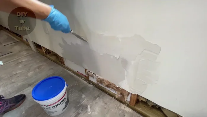 Sand the second coat, achieving a smooth surface.