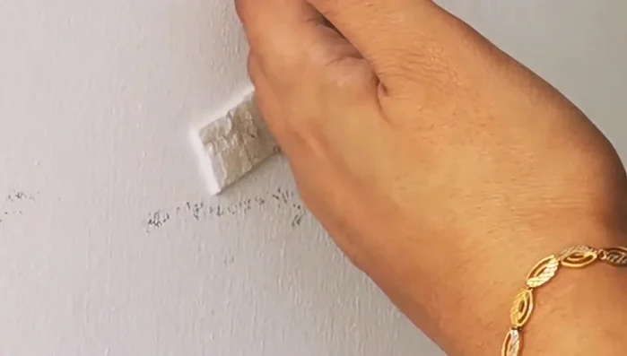 Remove any remaining sticky bumps using the same slow peeling technique.