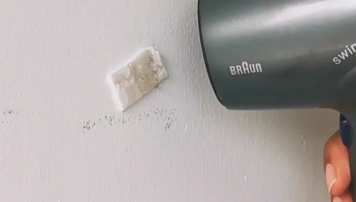 Remove any remaining sticky bumps using the same slow peeling technique.