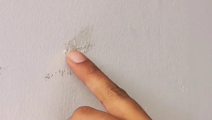 Remove any remaining sticky bumps using the same slow peeling technique.