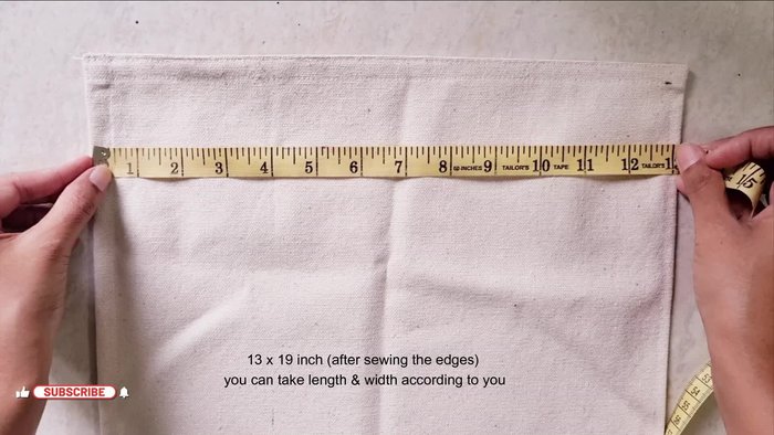 Prepare the pocket fabric. Cut a piece slightly wider than your organizer's base. Stitch all four sides. Add a stiffener or stitch the fabric for extra support.