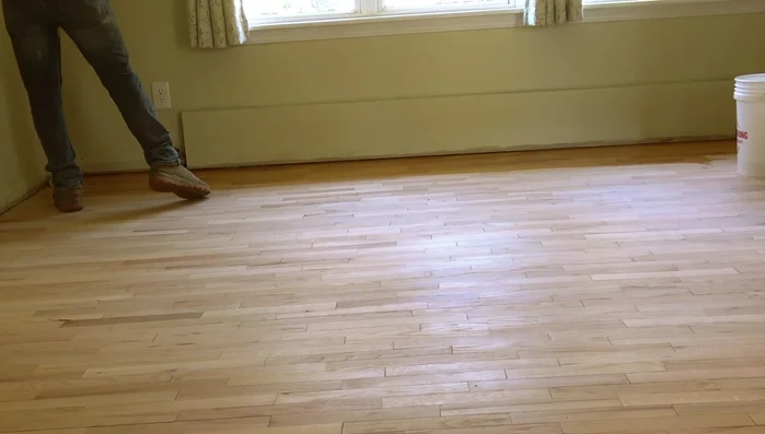 Finish Application: Apply the finish using a microfiber roller, working in the direction of the grain. Use a small brush for edges and corners.