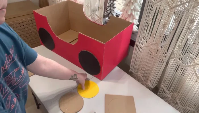 Attach push lights (optional): Hot glue push lights to the front of the car.