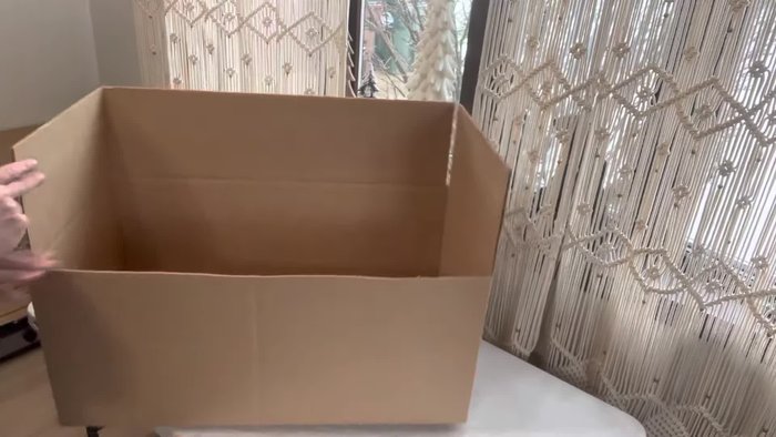 Prepare the cardboard box: Cut off both sides, front, and back flaps.