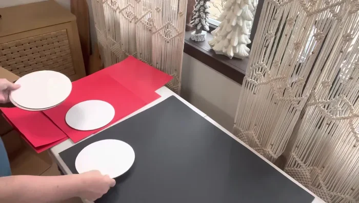 Add hubcaps: Hot glue pie tins to the tires for hubcaps.