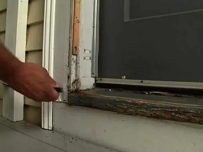 Remove the old threshold pieces using a pry bar. You may need to split the center section.