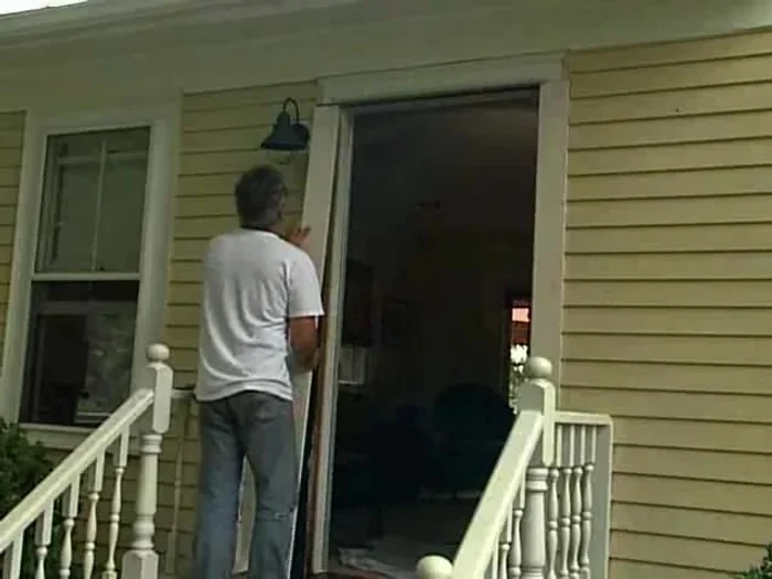 Replace any molding removed earlier and apply a final coat of paint.