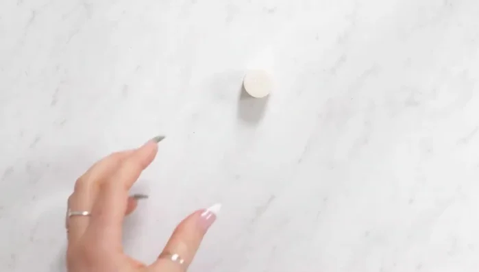 Attach decorative knobs to the PVC end pieces using heavy-duty glue (or by sanding down the PVC's inside for a sliding fit).