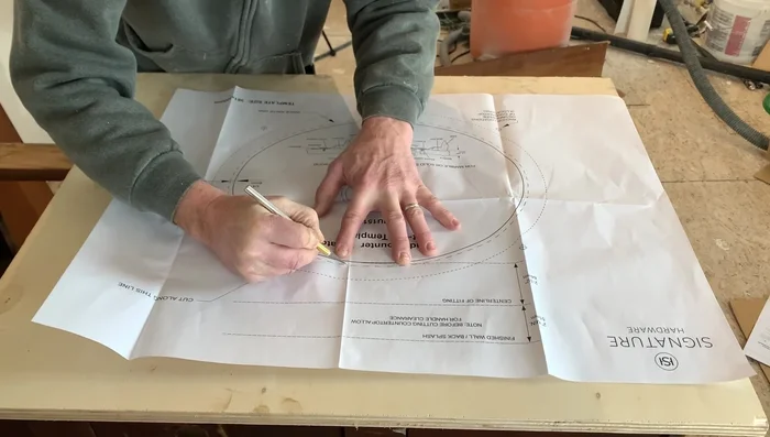Cut out the sink hole using a drill, jigsaw, and router for a smooth edge. Adjust the cutout as needed to ensure a proper fit.