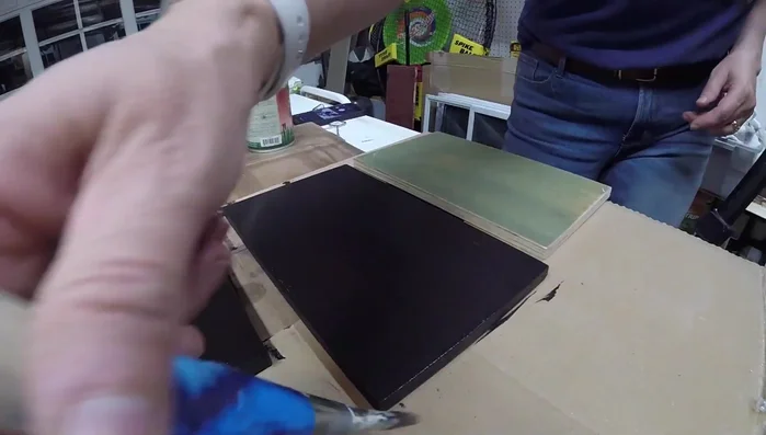 Assemble and secure the cutout section of the drawer with wood glue and brad nails.