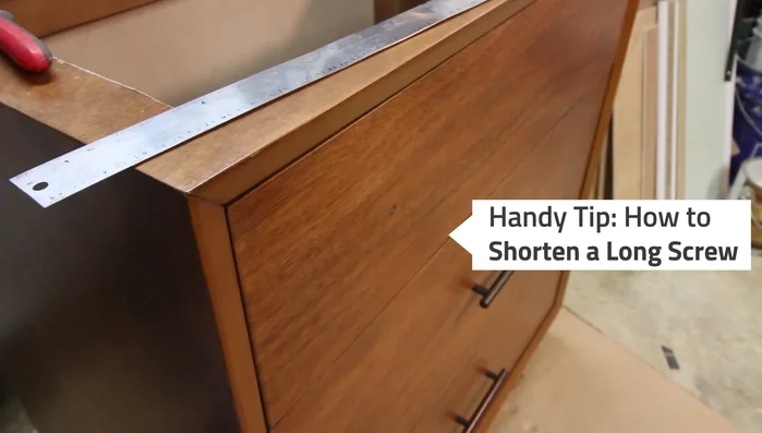 Shorten the drawer knobs using electrician's pliers to fit the modified drawer.