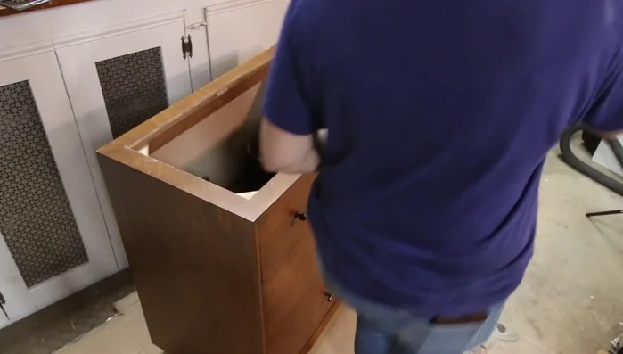 Install the sink and faucet.