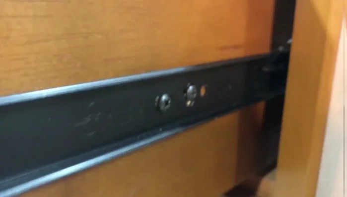 Remove the dresser legs and replace them with square feet, securing them with wood glue and trim nails.