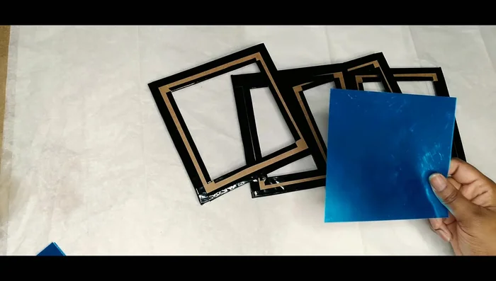 To create 45-degree angled corners on the mirror strips, butt two ends together and cut down the middle with scissors.