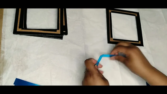 To create 45-degree angled corners on the mirror strips, butt two ends together and cut down the middle with scissors.
