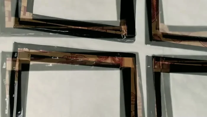 Cut popsicle sticks to appropriate lengths.