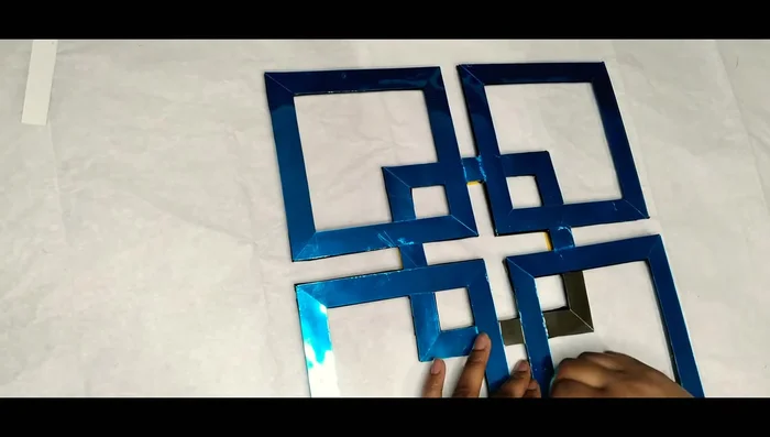 Remove protective films and add hanging mechanism.