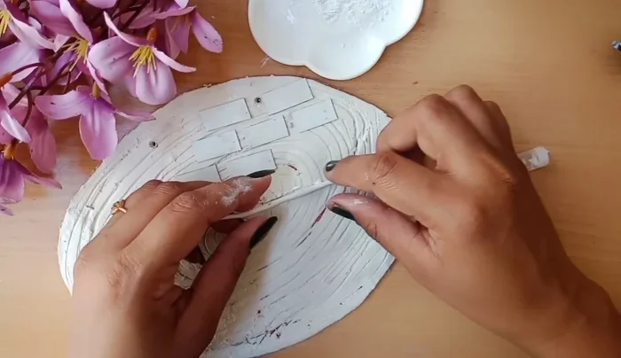Make leaves from clay and stick them.