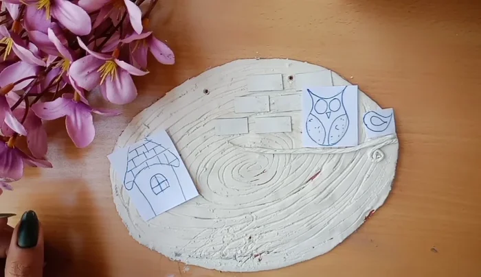 Add texture to the clay using tools.