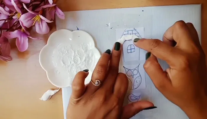 Add texture to the clay using tools.