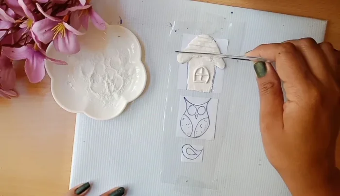 Add texture to the clay using tools.