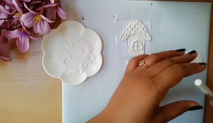 Make leaves from clay and stick them.