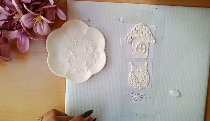 Make leaves from clay and stick them.