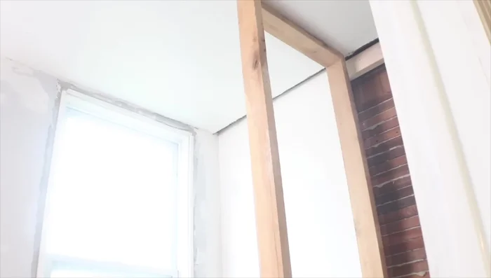 Install plywood on most closet walls. Screw the framing into existing wall framing, adding additional 2x4s where needed.