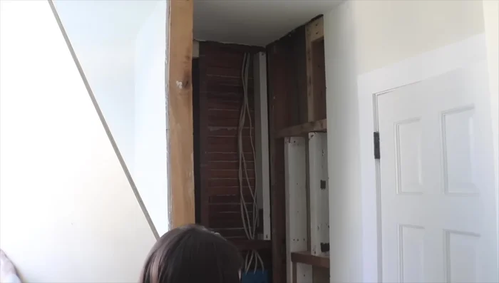 Install plywood on the closet's interior. Cut plywood into sections if necessary due to wall irregularities.