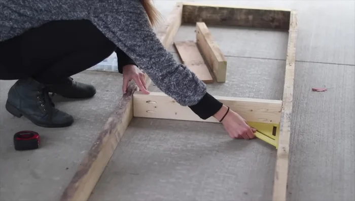 Install plywood on most closet walls. Screw the framing into existing wall framing, adding additional 2x4s where needed.