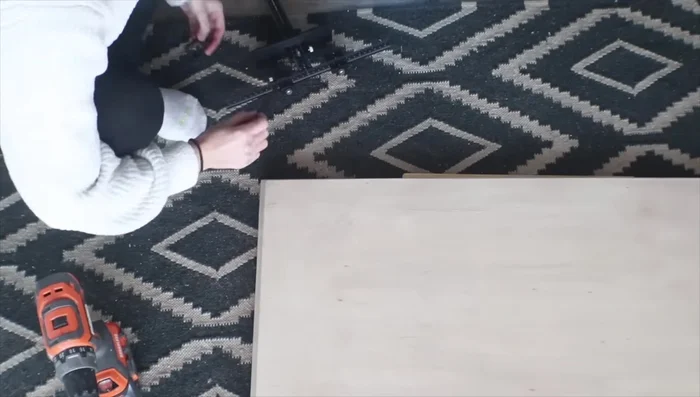 Install the doors, and use a cabinet jig for precise handle placement.