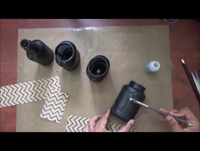 Apply a strong adhesive (silicon glue recommended) to the bottle and adhere the burlap strip, ensuring it's smooth and wrinkle-free.