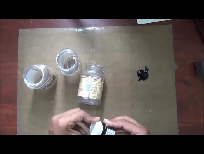 Prepare the DIY chalk paint: Mix black acrylic paint with a small amount of gypsum (Plaster of Paris) and water to achieve a smooth, paintable consistency. Don't make it too runny.