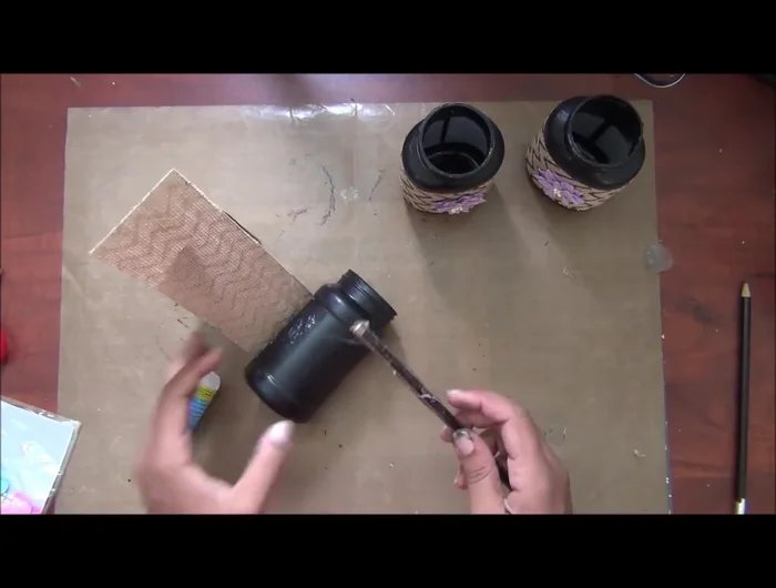 Fill the bottles with potting soil and plant your succulents or other plants.