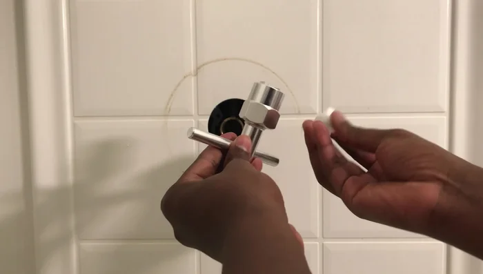 Remove the old cartridge using either a Moen puller or vise grips and the small white plastic piece. The Moen puller is recommended for easier removal.