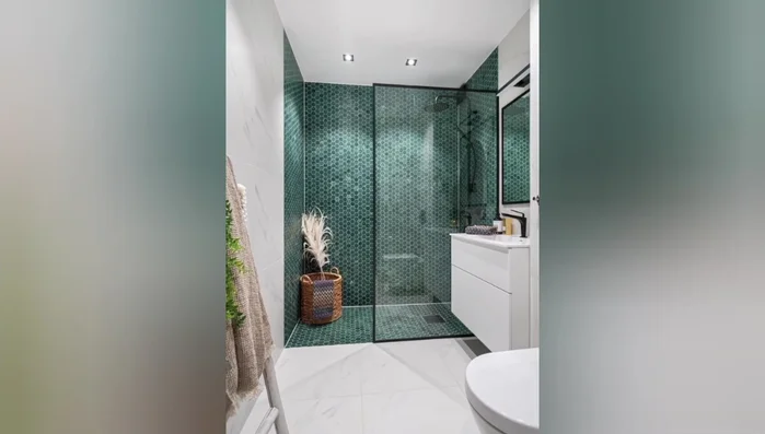 Add a freestanding linen cabinet (if space allows).