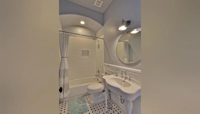 Use a vintage-style shower curtain if you have a clawfoot tub.