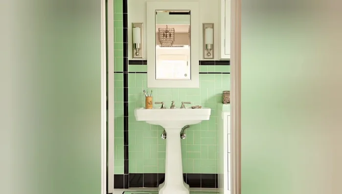 Add a mosaic tile backsplash behind the sink or bathtub.