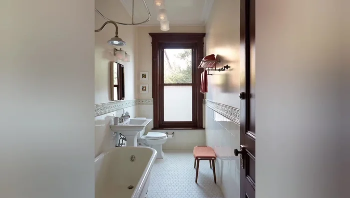 Add a freestanding linen cabinet (if space allows).