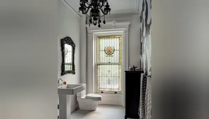 Use a vintage-style shower curtain if you have a clawfoot tub.