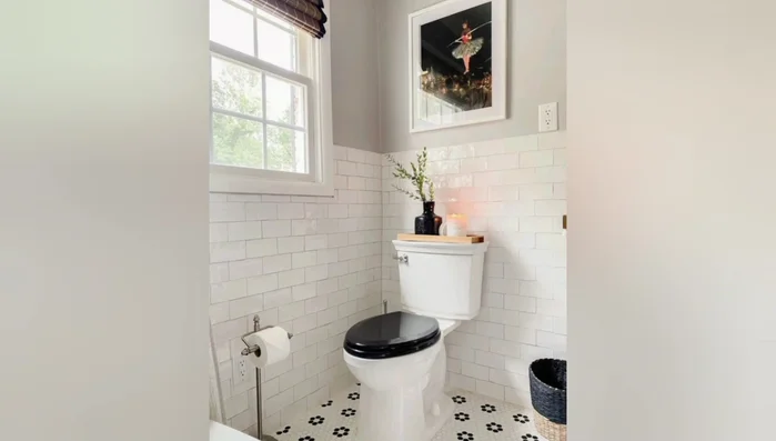 Add a mosaic tile backsplash behind the sink or bathtub.