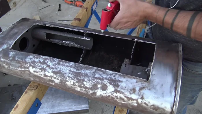 Clean the metal thoroughly using a pressure washer.