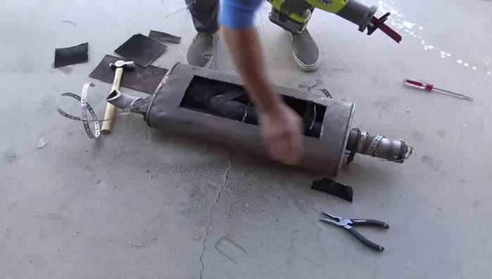 Remove unwanted inner components (pipes, steel wool, etc.) using an angle grinder or reciprocating saw.