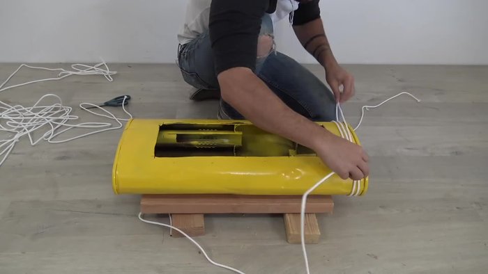 Locate and retrieve discarded metal objects (e.g., a rusted muffler).