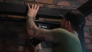 DIY Industrial Canopy Bed with Integrated Directional Lighting