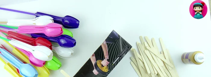 Make the flower basket: Glue popsicle sticks around the empty box to create the basket.